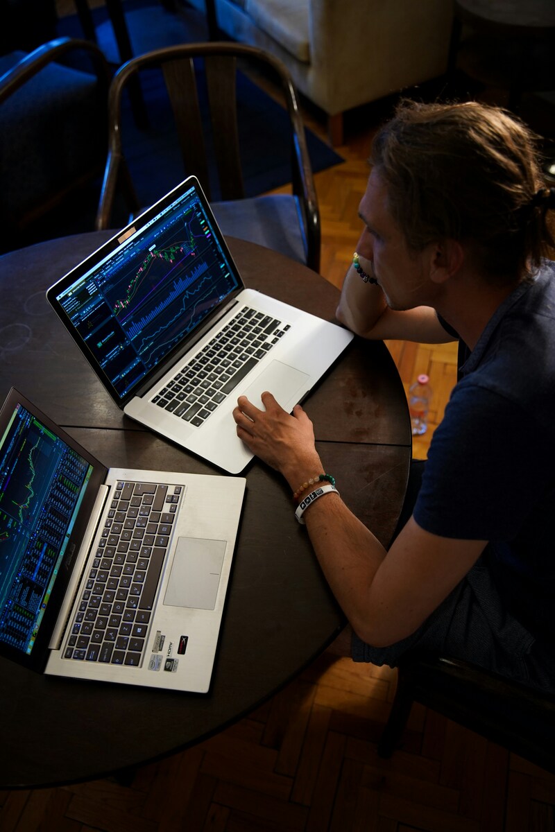 Karim coding on a laptop